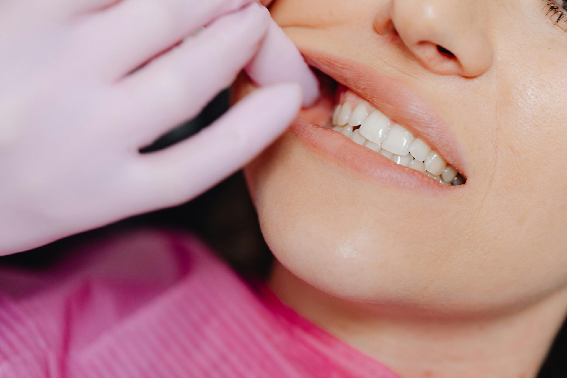 Dental professional performing a patient checkup to support healthy teeth, gums, and overall oral health.